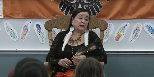 Woman sharing stories with Canadian classroom during TRW
